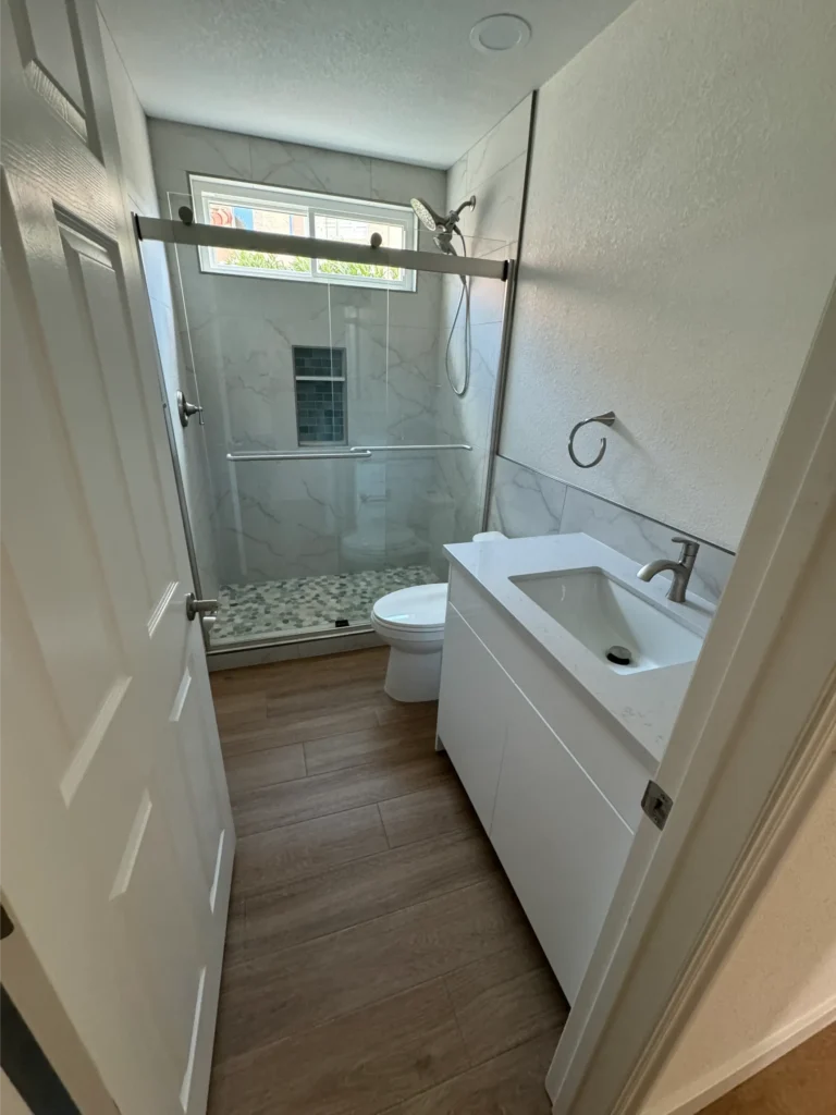 vanity with granite counter top custom shower bathroom renovation