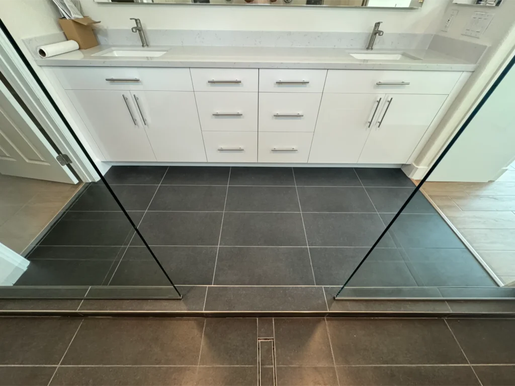 bathroom remodel granite countertops tile shower and flooring