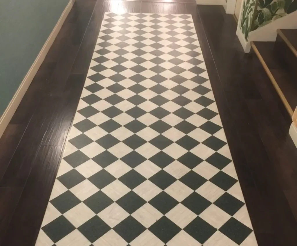 checkered tiled flooring with cherry wood surround