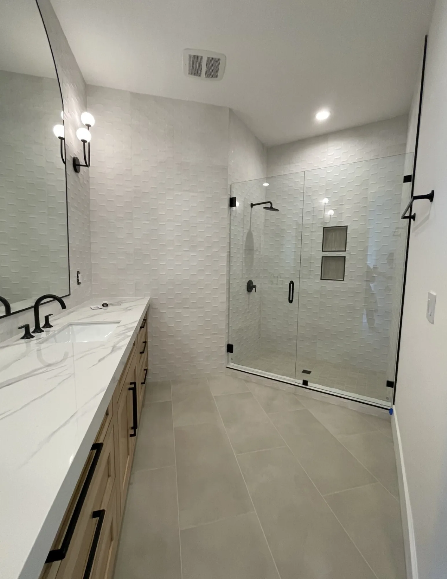 custom tile flooring bathroom remodel with custom shower build